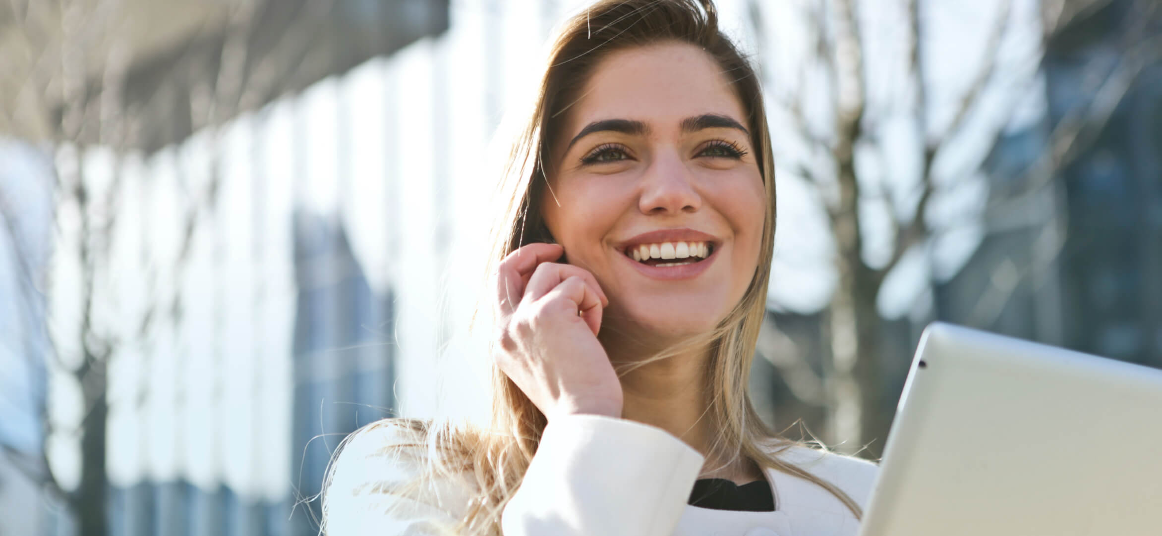 A woman talking on her phone.